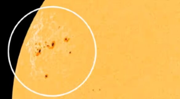 Scientists warn of a cluster of dark spots on the sun that is fifteen times broader than Earth.